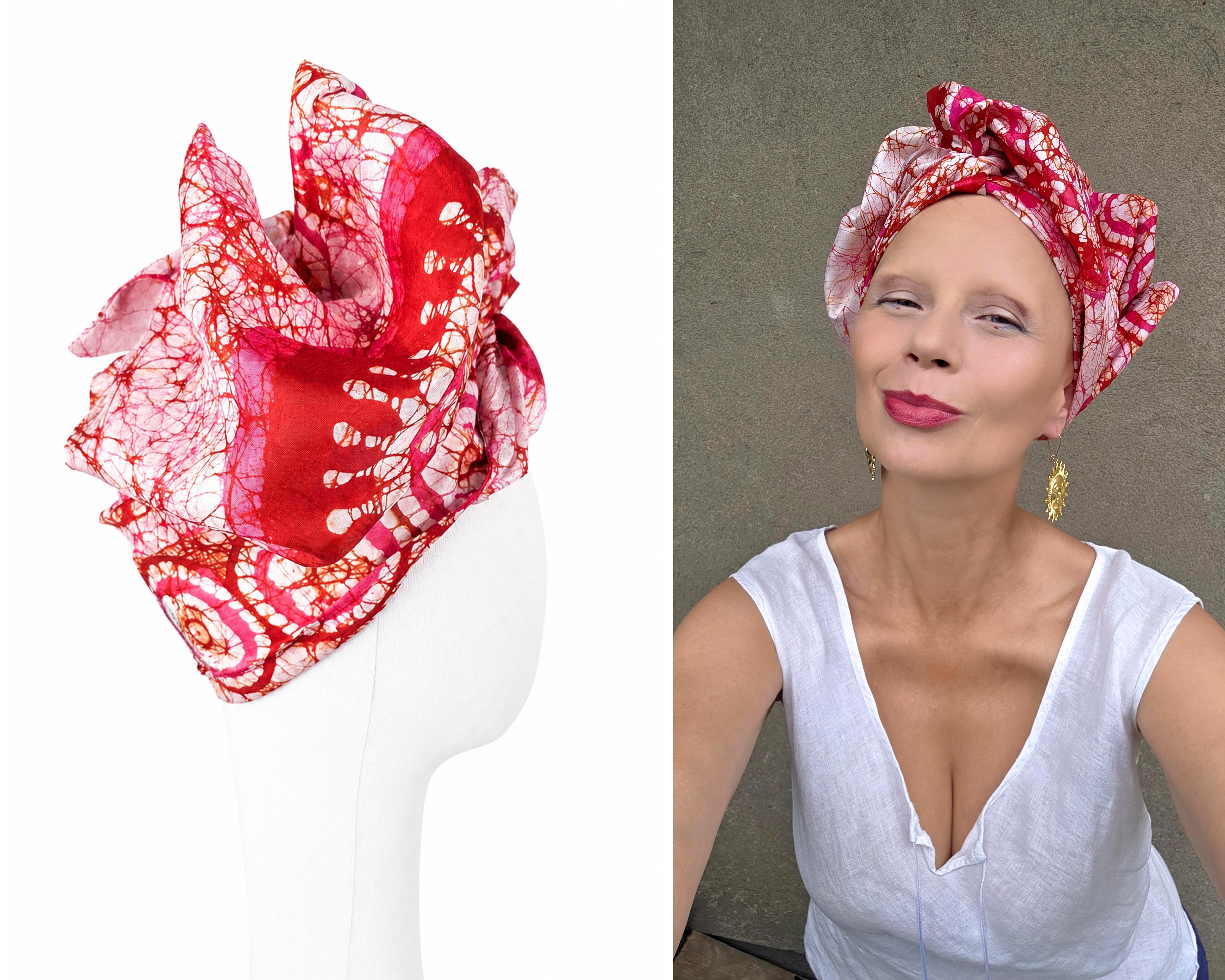 Long red and pink silk turban by GLINKOWSKA wrapped on the head