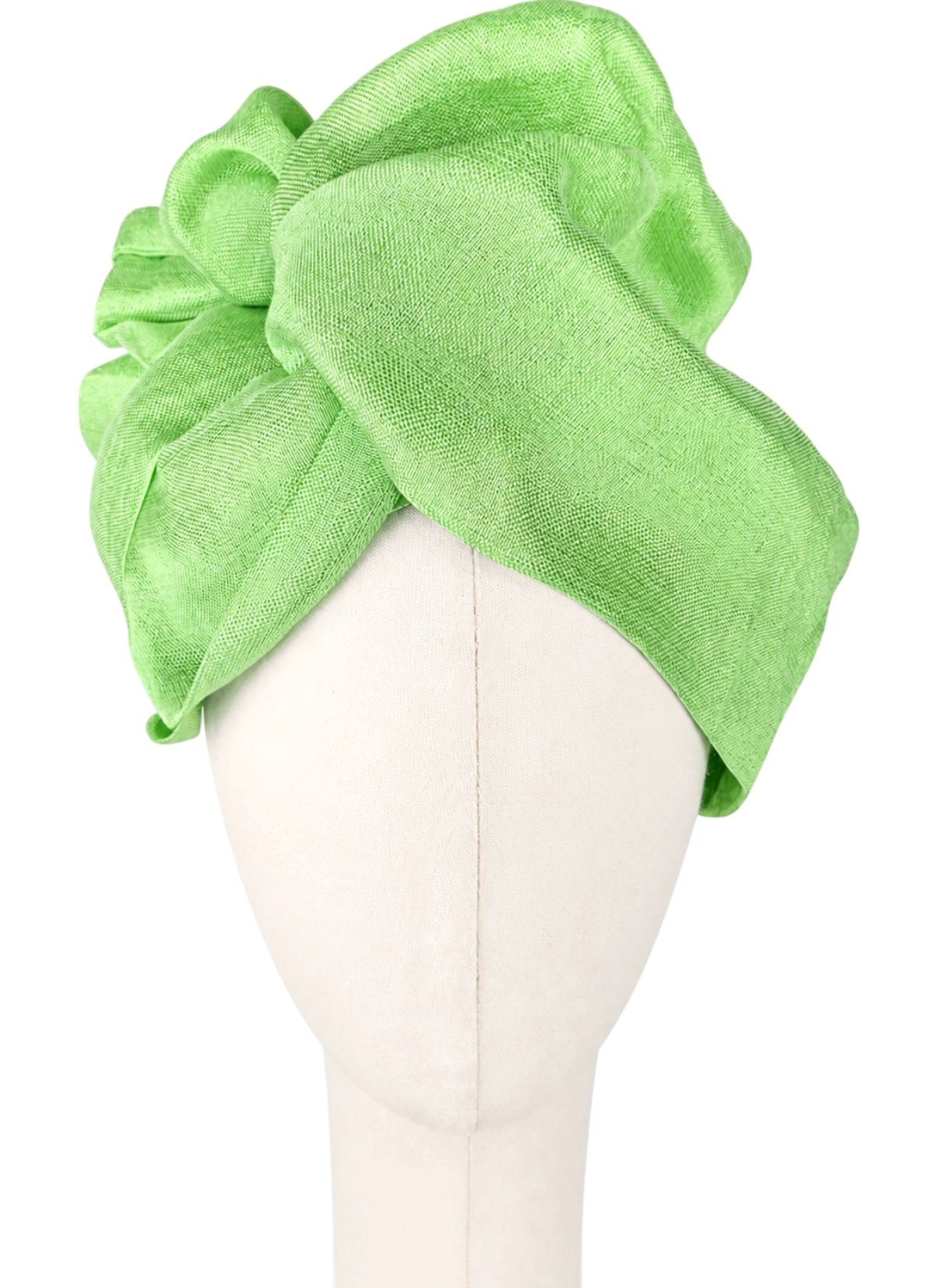 Women's green Twist Long turban shown from the front on a cream-colored faceless mannequin. The thin, slightly sheer fabric is a vibrant lime green with a subtle sheen. Two wide folds cross above the forehead, while the fabric forms tall, soft loops and twists at the top. The lighting highlights the fine weave of the fabric.